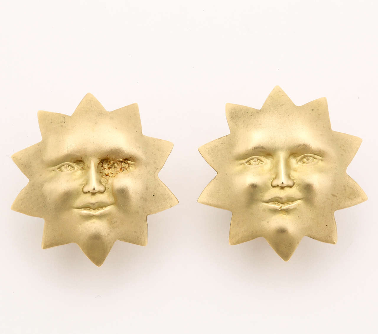 These 18 kt gold sun face earrings are made with clips. A post can be added upon request. The message sent to the receiver of these earrings is that she is your Sunshine every day of your life. Your day begins and ends with the light of your life.