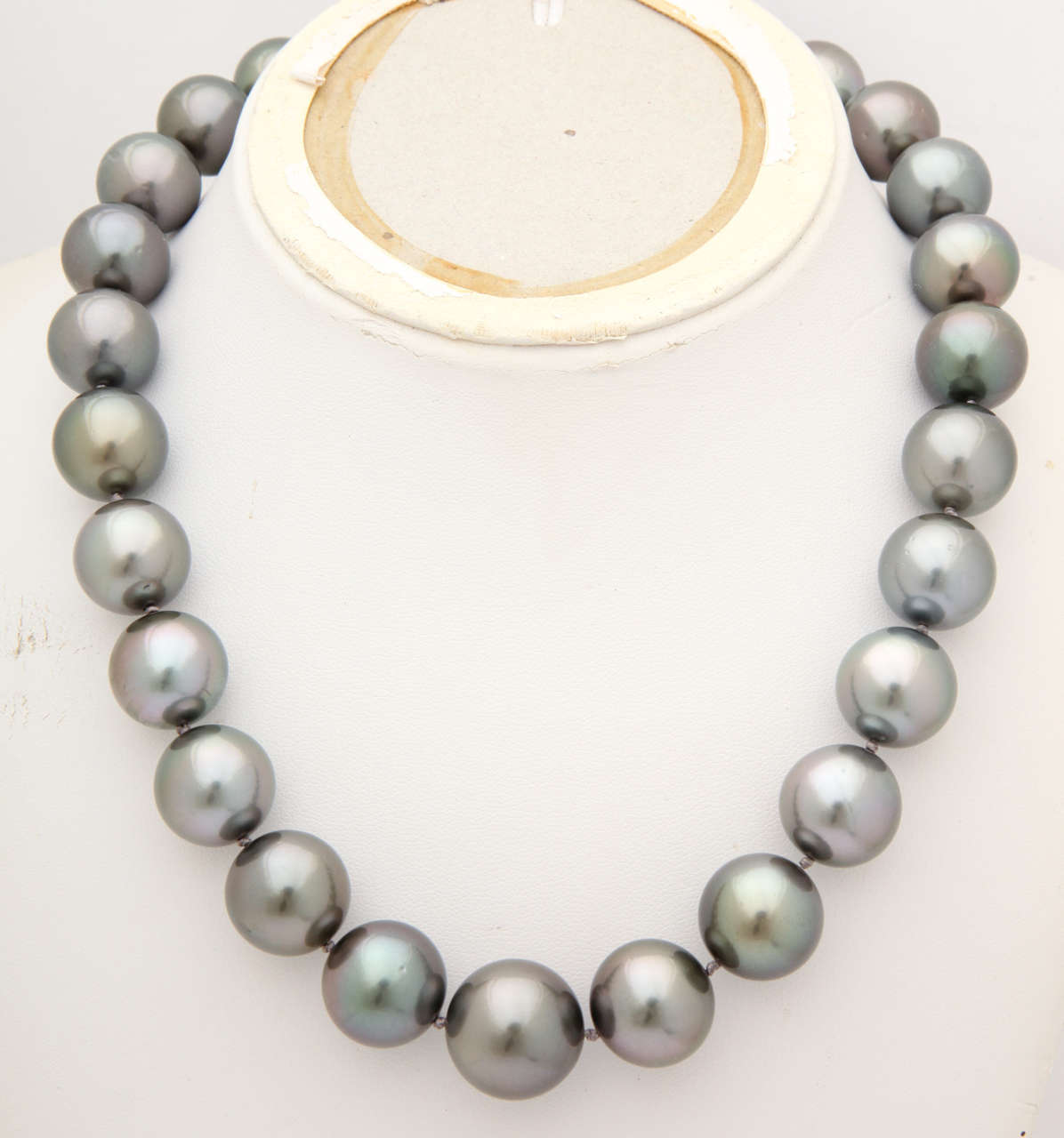 The luster on these pearls is superb. They are extra large, graduating from 17.7 x 15.1. This impressive necklace is finished with an 18 kt white gold  lattice design clasp set with 0.20 cts of white diamonds. A must for the discerning pearl