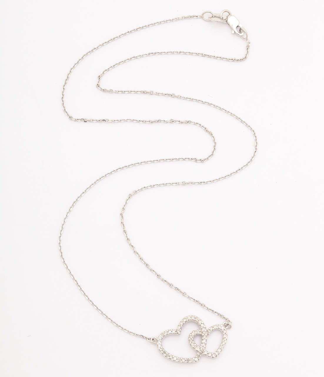 Contemporary Diamond Gold Double Heart Pendant Necklace For Sale