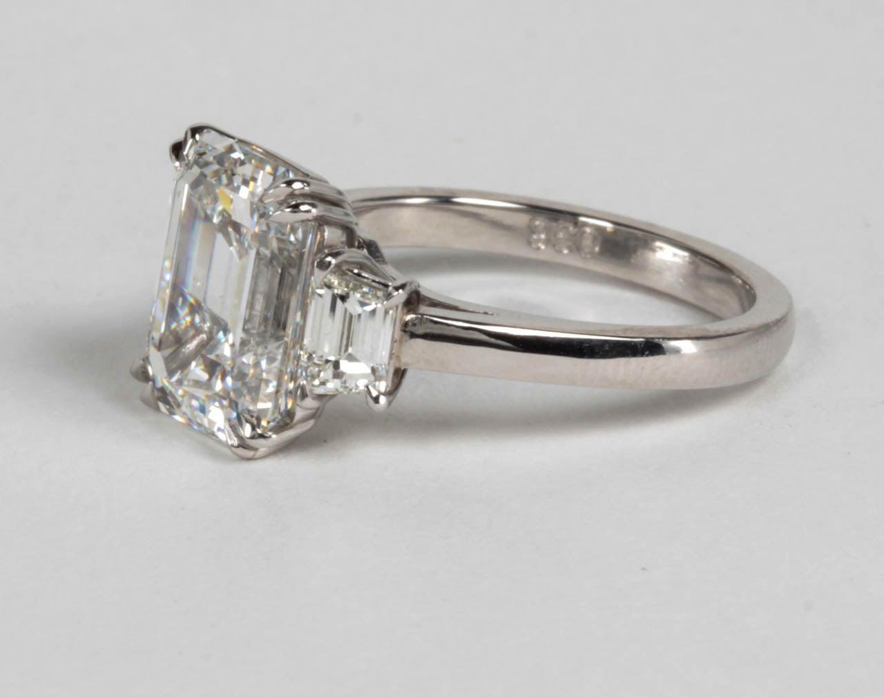 GIA Certified Emerald Cut F VS1 Diamond Platinum Ring In New Condition For Sale In New York, NY