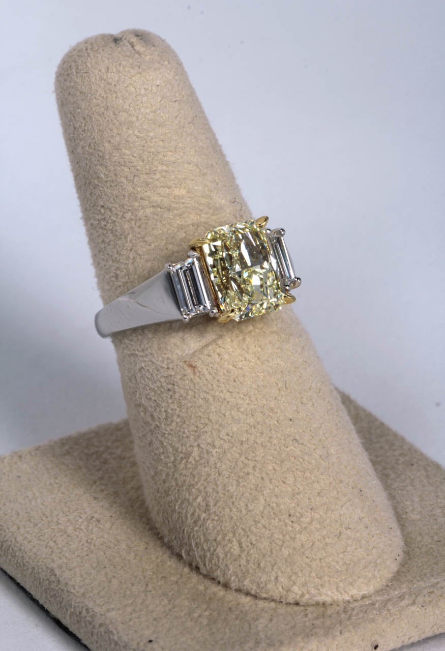 Radiant Cut Unique GIA Fancy Light Yellow Diamond Engagement Ring For Sale