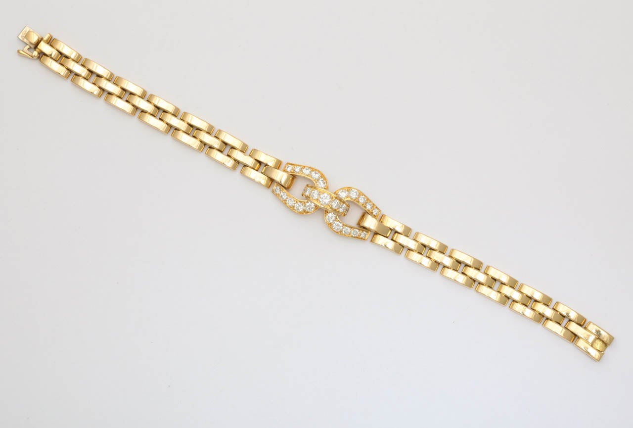 18kt yellow gold Flexible Gold and Diamond Panther Link Bracelet Designed By CARTIER PARIS With Numerous Super High Quality Full Cut Diamonds