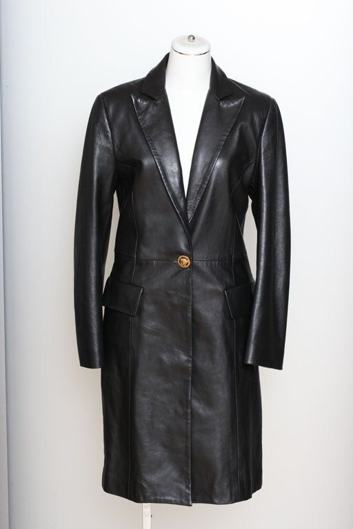 Versace Jeans Couture leather coat in black.
It has Medusa button with the logo.