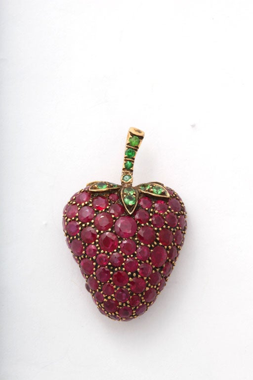 18kT YELLOW GOLD STRAWBERRY - BEAD SET WITH BURMESE RUBIES  & Prong set Tsavorites. Signed 750 on the pin & illegibly signed.