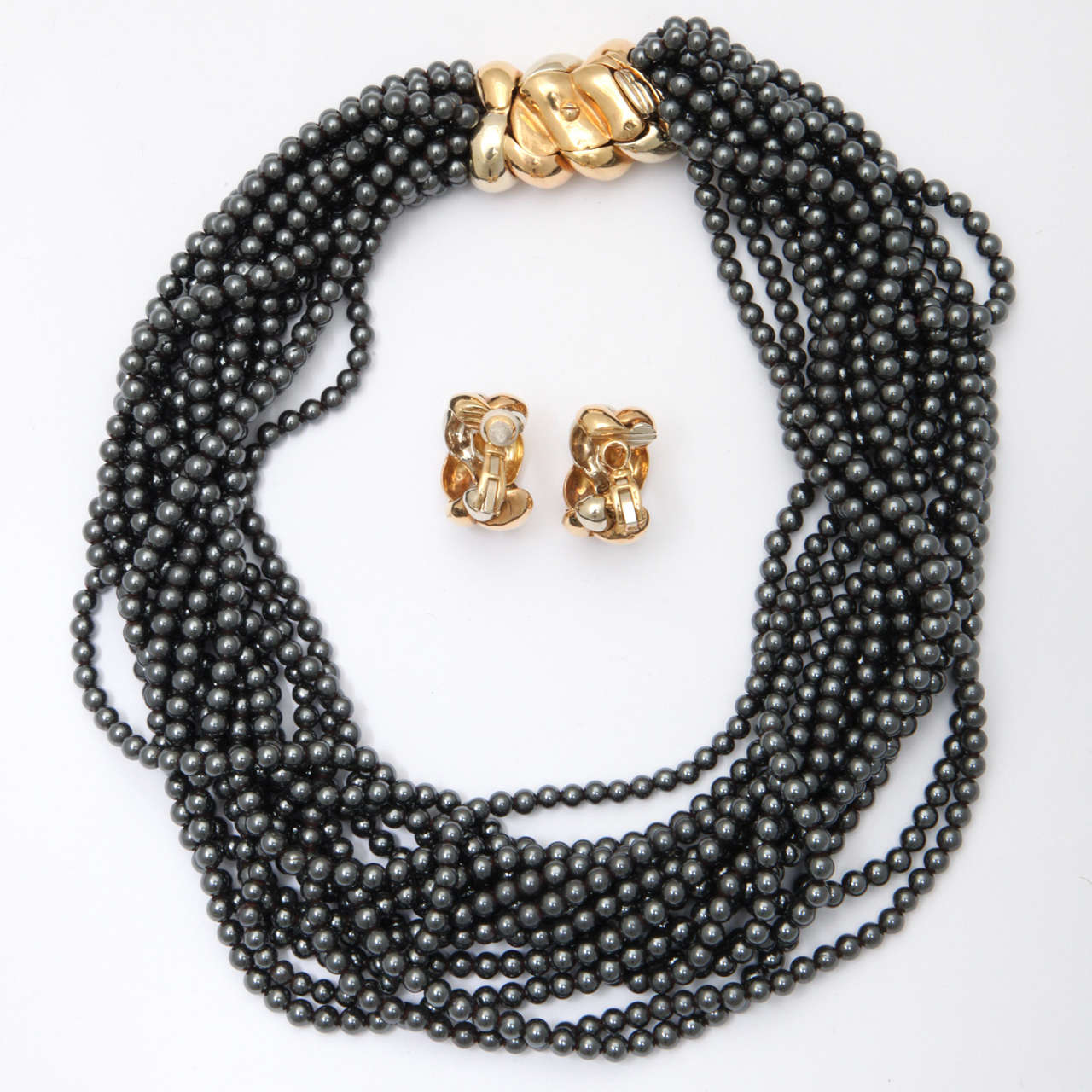14 Strand Hematite bead Necklace with Oversize 18kt White & Yellow Gold Necklace.  Very chic & High Style.  Earrings not included. Made by Poiray of The Place Vendome in Paris.d