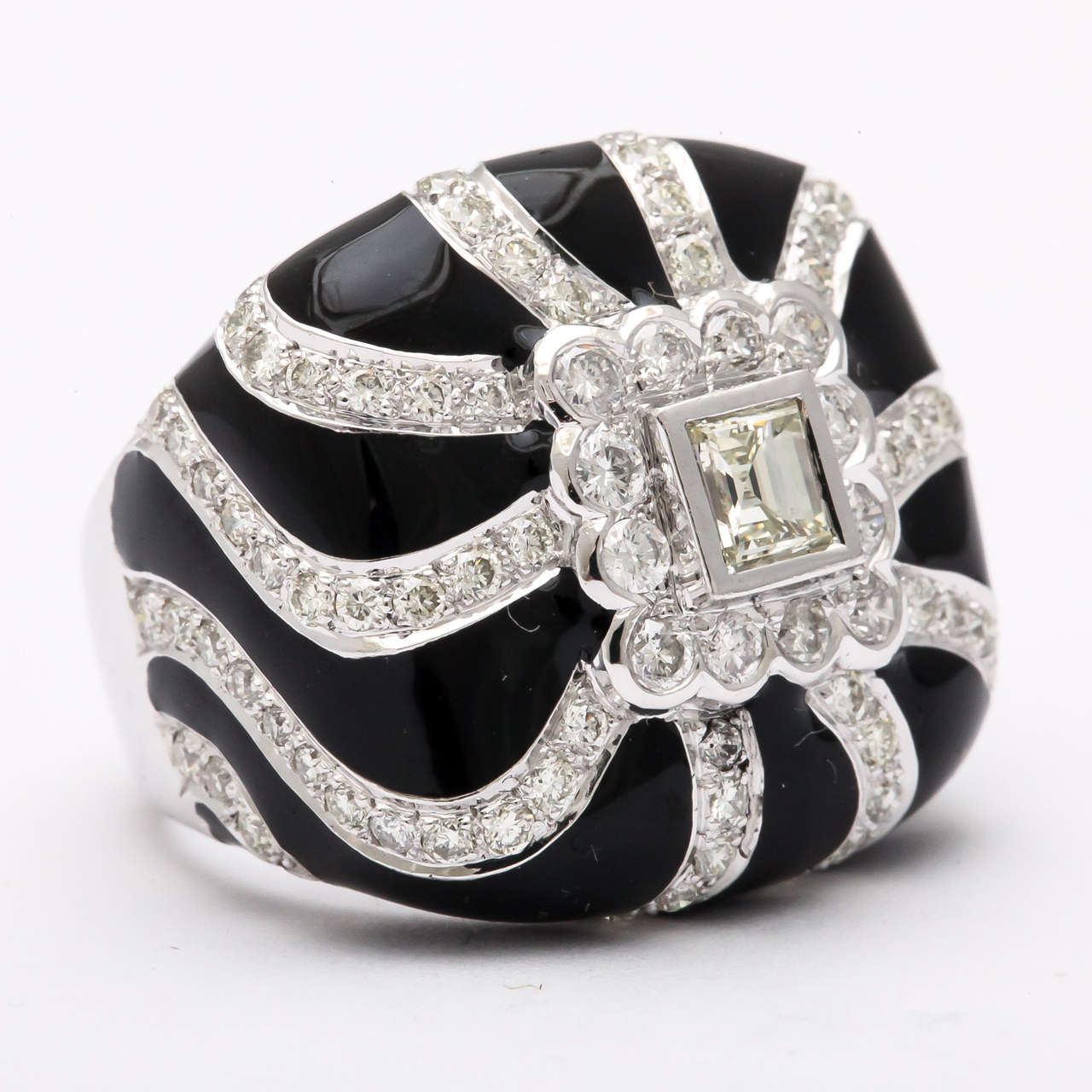 Stylish Black Enamel & DIamond set Swirl ring.  Hearkens to an earlier era with an update.