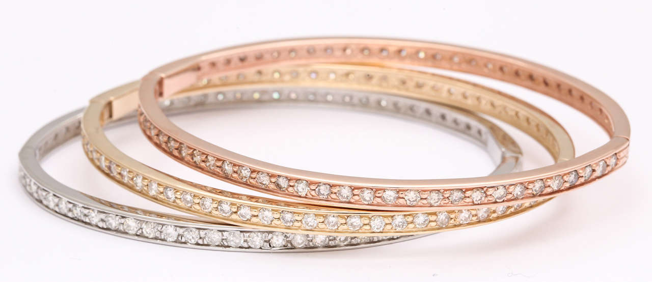 14K Yellow, white and rose gold diamonds featuring approximately 2.54 carats in each. Can be custom made in 18k. 

Can be sold sepreately