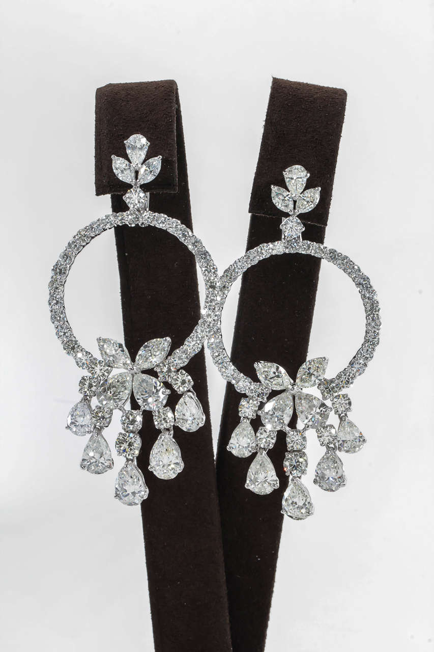 An exquisite earring to add to any collection. 

Approximately 31.50 carats of fine pear shaped, marquise and round diamonds set in platinum. 

These earrings measure approx 2.75 inches long and 1.25 inches at the widest point.