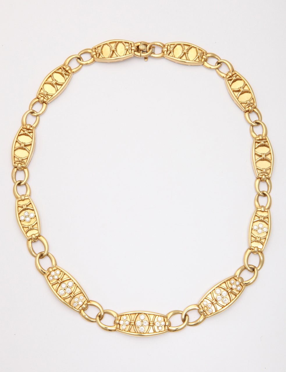 !8kt Yellow Gold Necklace.  Each link is connected with oval rings & is backed with gold.  Five links are bezel set with full cut Diamonds.