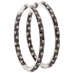 A Pair of Black and White Diamond White Gold Hoop Earrings