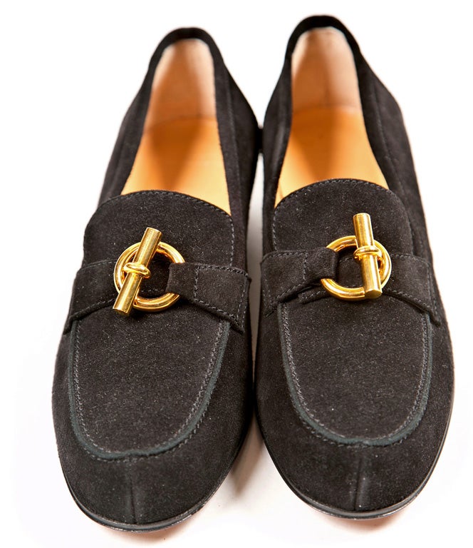funkyfinders.com is offering these never used, mint in box hermes black suede loafers. signature brass fittings are notable. they are a size 36.5. i've been told that this particular style is extremely comfortable and a favorite among hermes