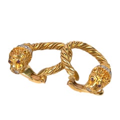 Gold Ram's Head Earrings with Diamond Clip Back Presented by Carol Marks