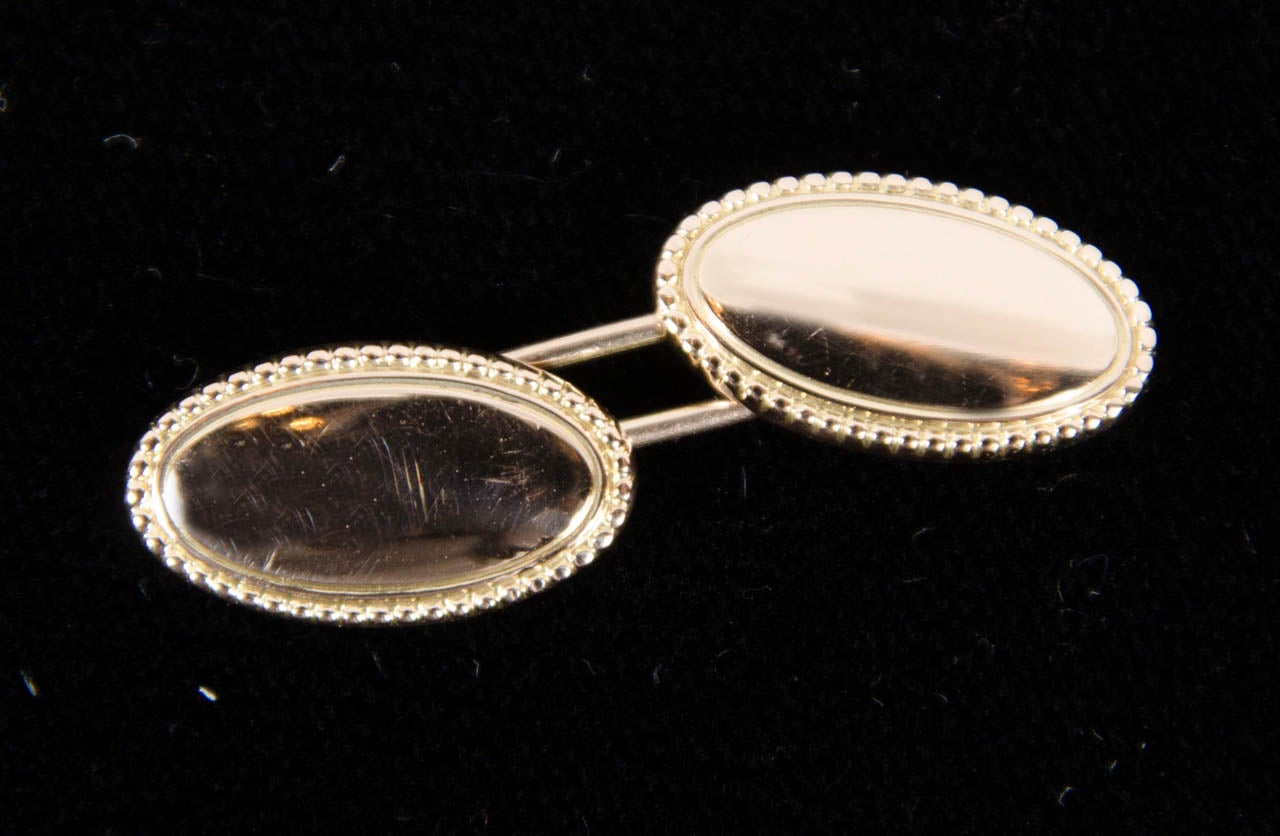 Paar ovale Art-Déco-Manschettenknöpfe aus Gold mit Seildetails im Angebot 1