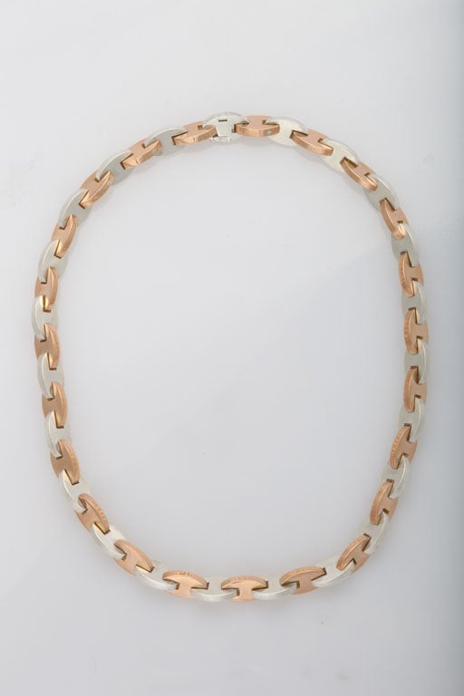 The contrasting gold and silver elements, seamlessly joined, create a clean, elegant and very modern design - just what you would expect from Hermès jewelry. Its length of 16 inches is pure perfection - it touches the collar bone ever so perfectly.