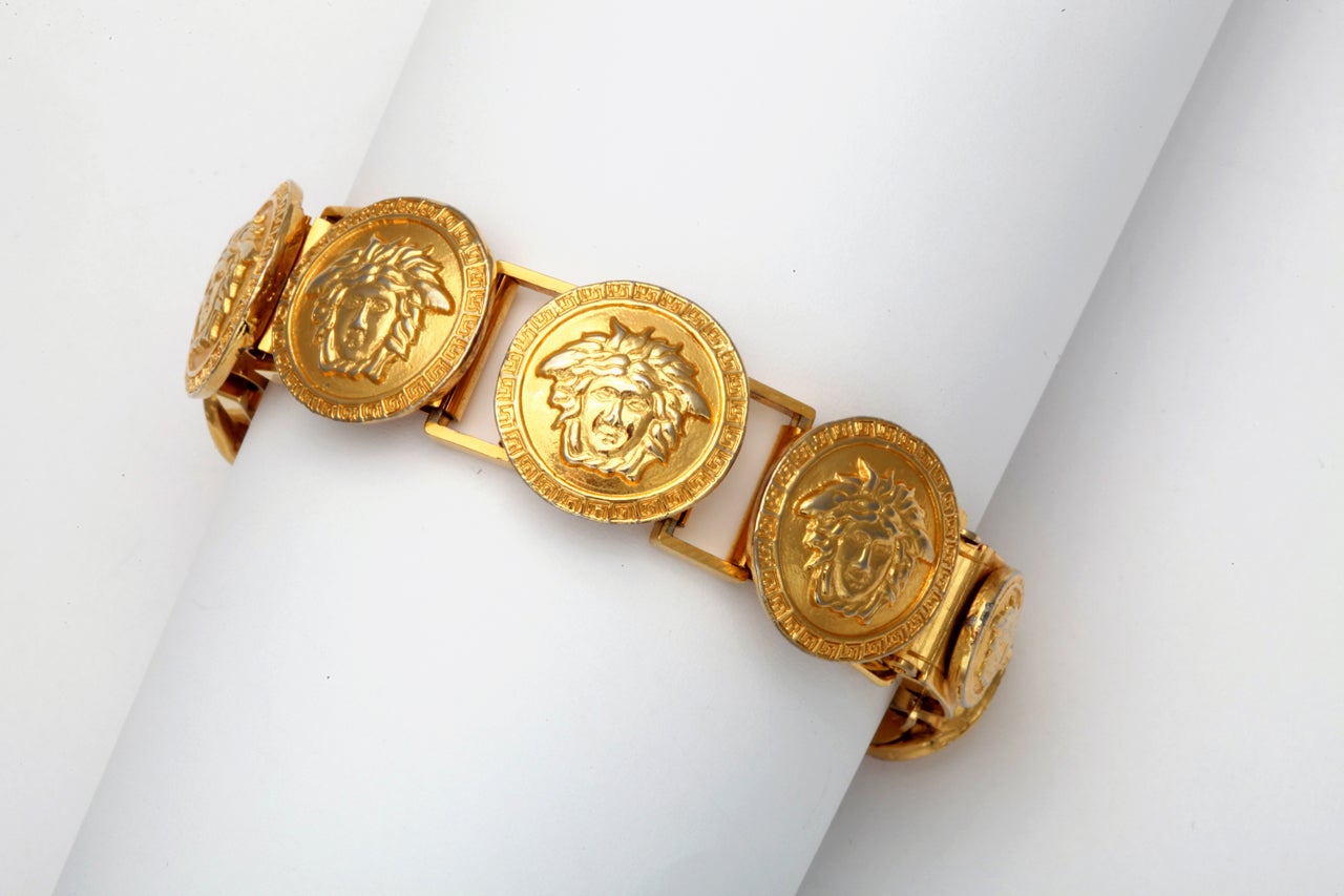 Gianni Versace bracelet with 8 Medusa motifs.