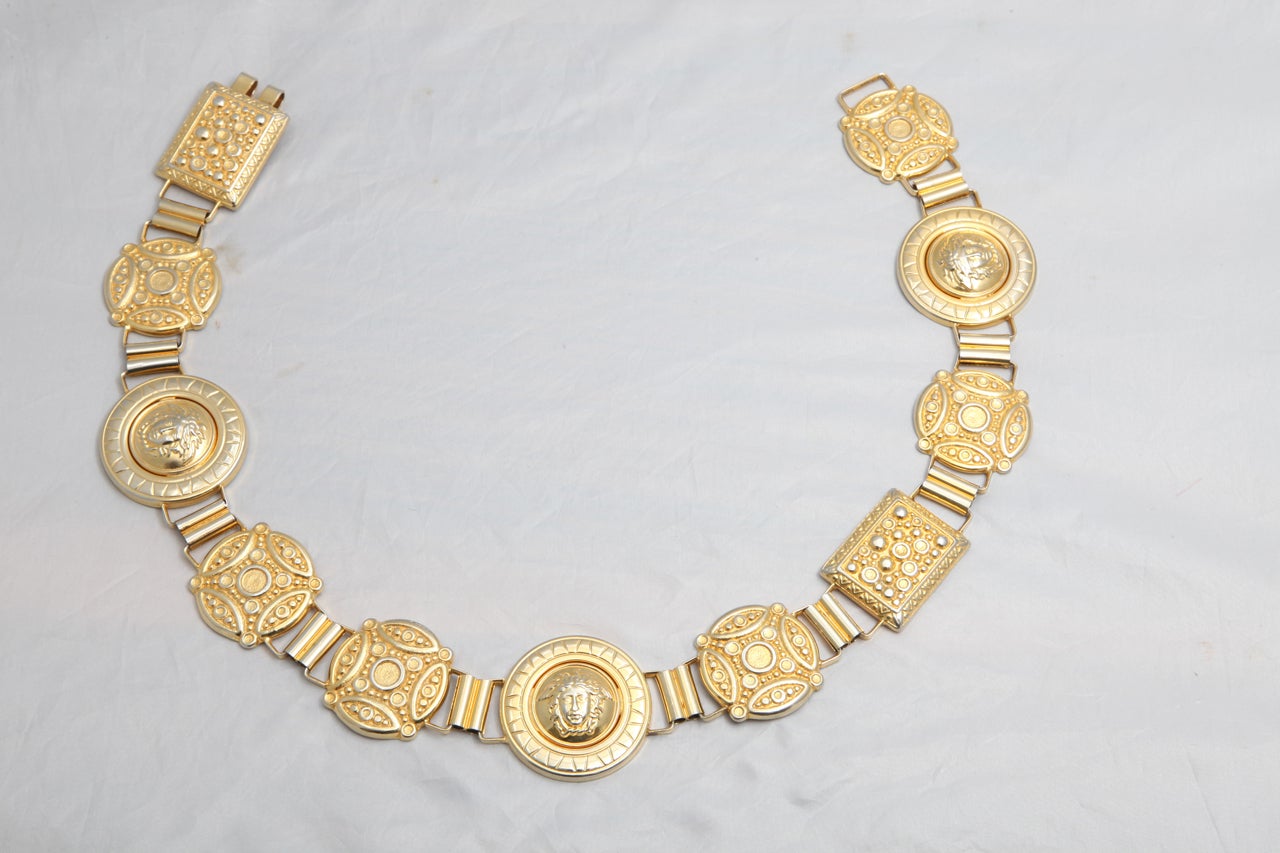 Gianni Versace massive belt with iconic Medusa motif.
