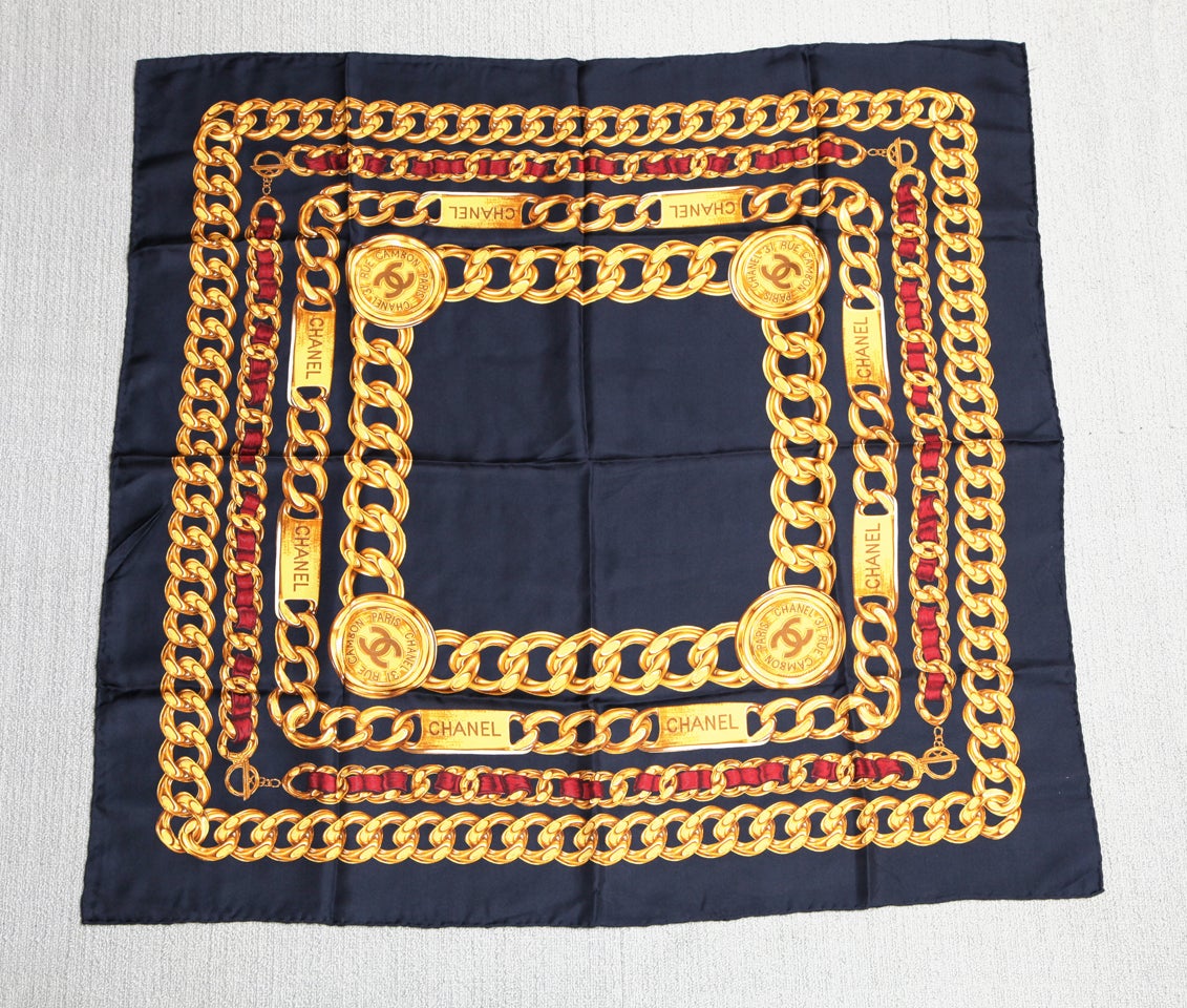 Iconic Chanel chain motif scarf in navy.
