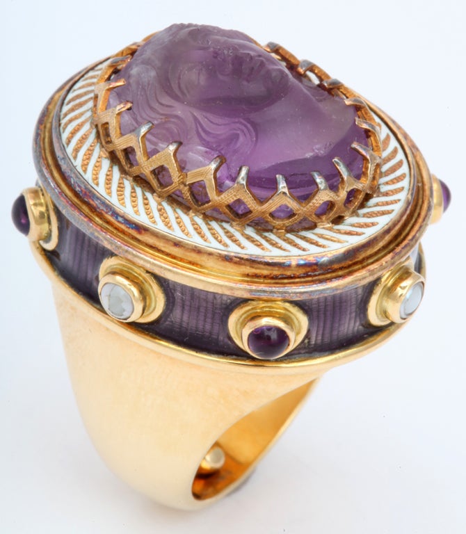 18kt heavy gold amethyst and pearl ring with white and purple enamel accents with alternating cabochon pearl and amethyst stones.