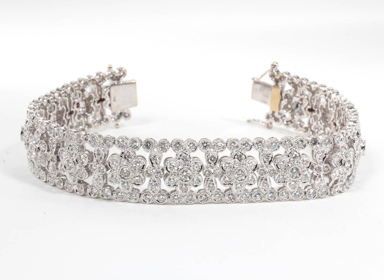 8.66 carats of vibrant round brilliant diamonds set in 18k white gold.

A stunning bracelet with a classic vintage feel.