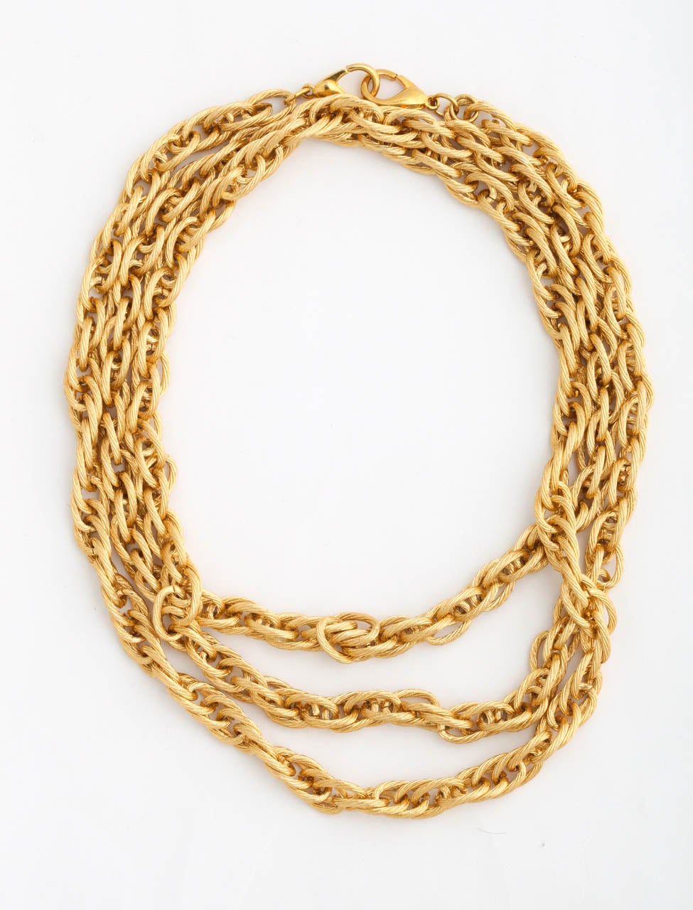 Rope textured, bright goldtone chain necklace. Lightweight.