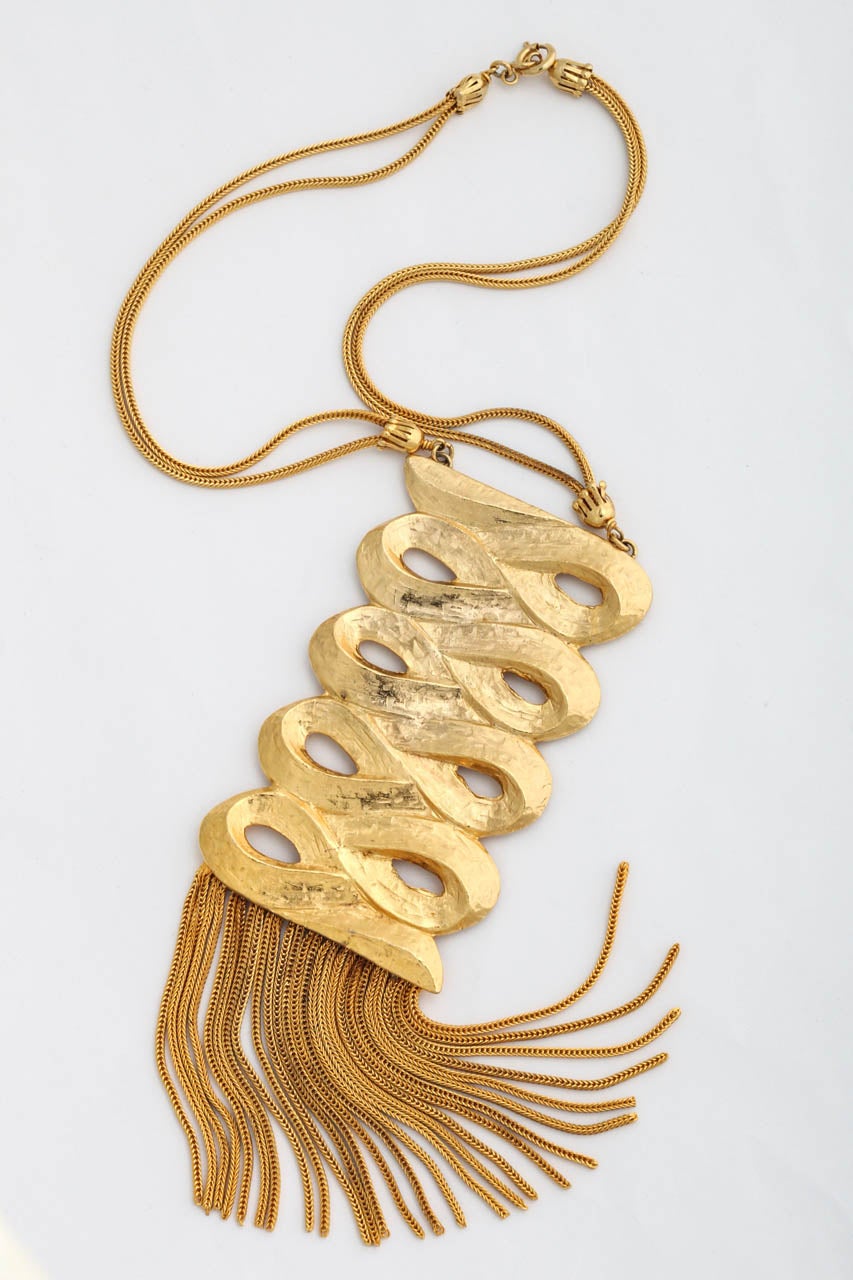 Two-tone gilt, signed Sandor scroll and fringe necklace. Chain is 8