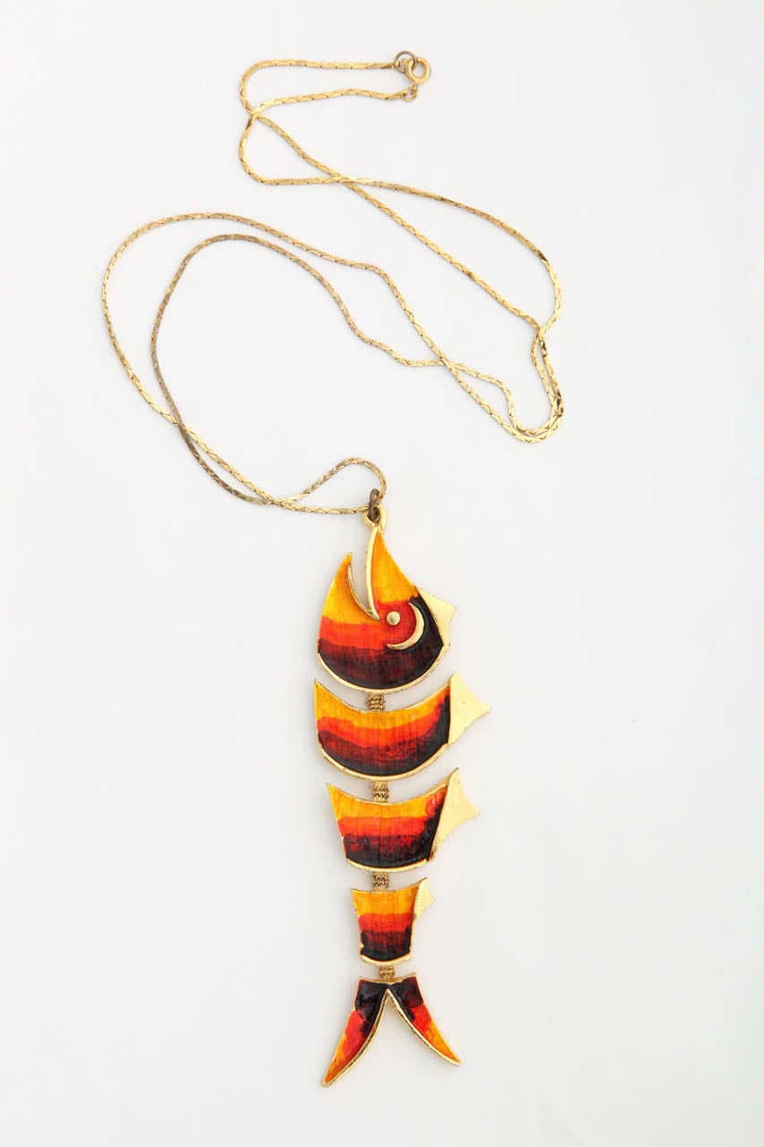 Articulated, enameled fish pendant necklace in yellow, orange, and deep red on long sleek gilt 30