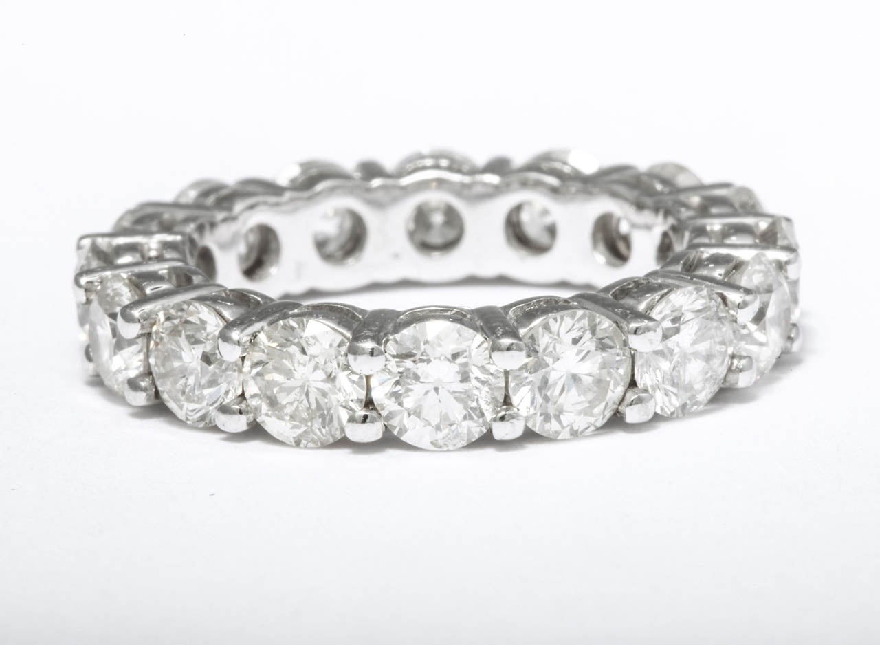 18K White gold diamond eternity band featuring 16 diamonds weighing 5.16 cts. 

Average Stones: 0.32 CTS
Color: H
Clairty: SI2

Sizeable