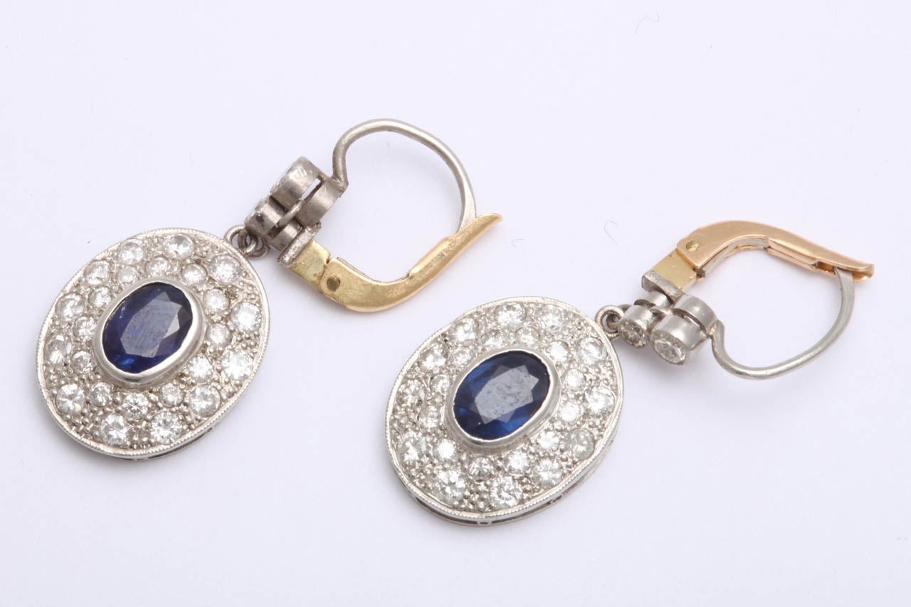 Platinum And  Diamond And Sapphire Art Deco Lever Back Hanging Pendant Earrings They Are Very Flexible And Swivel Back And Forth  for movement Diamond Pendants Are Centering 1 carat Ceylon sapphire Total diamond Weight 2 carats