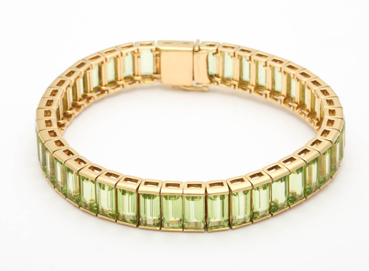 1960s Square Cut Peridot Gold Straightline Bracelet In New Condition In New York, NY