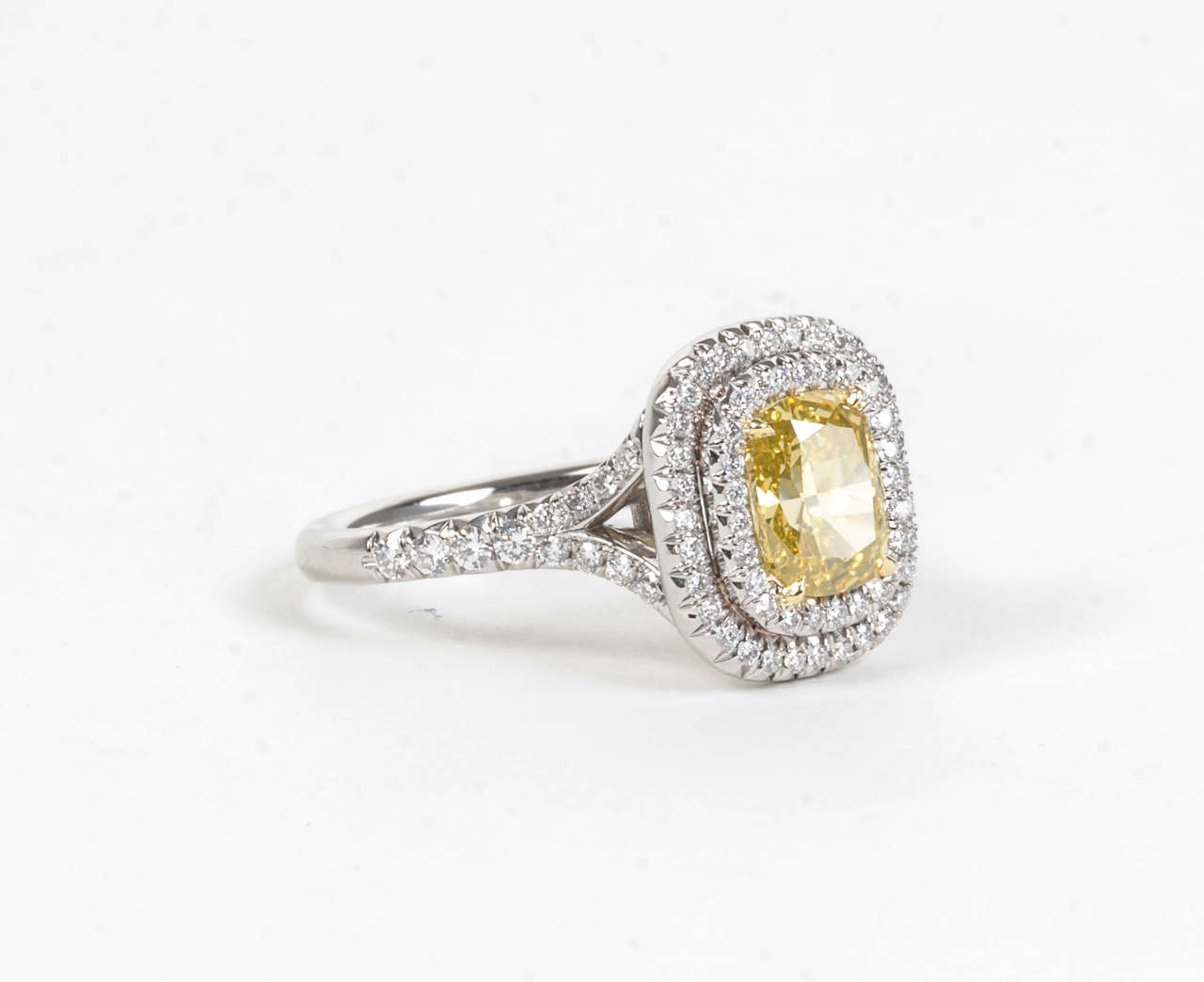 Women's Rare Cushion Cut GIA Certified Vivid Yellow and White Diamond Platinum Ring For Sale