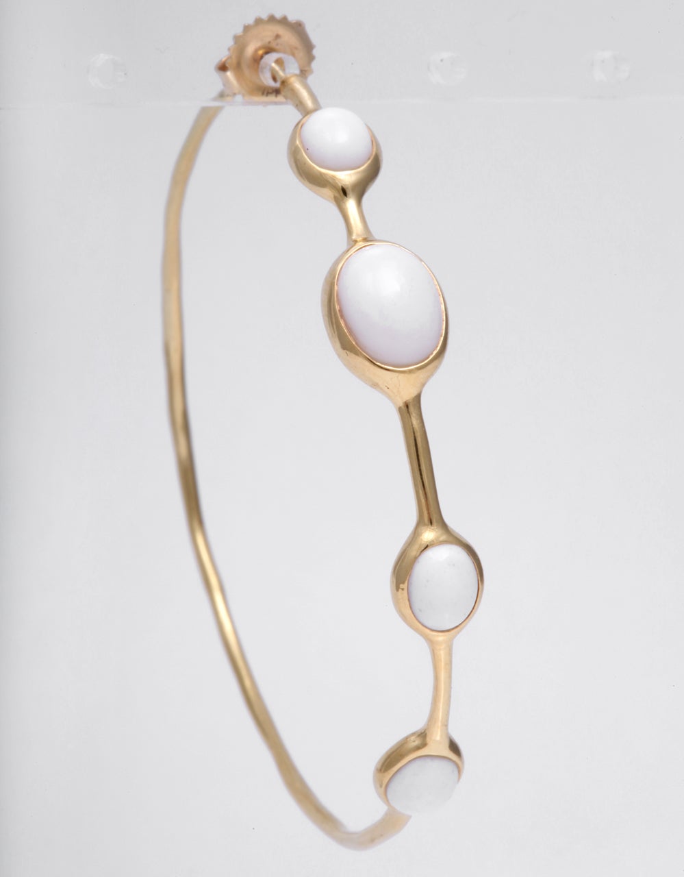 Signed Ippolita, this rock candy hoop earrings are crafted in 18k gold.