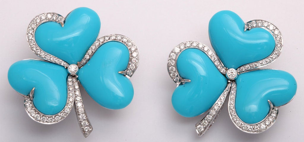 Beautifully made Italian 3 leaf clover earclips featuring 3 heart shaped pieces of turquoise framed by diamonds.  The 18k white gold workman ship is incredible - just look at the backs.