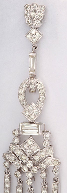 Round Cut Dangling Diamond Gold Chandelier Earrings For Sale
