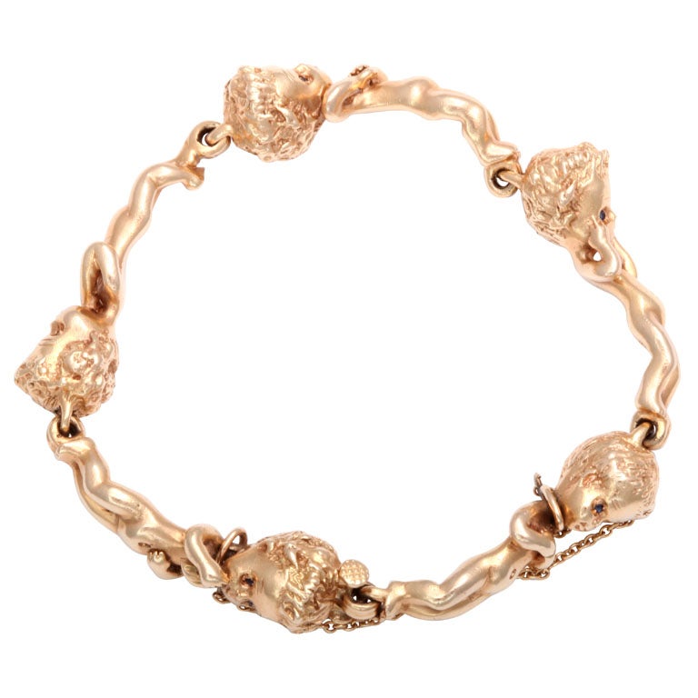 Ruser Delightful Child or Children of the Week Gold Bracelet at 1stDibs