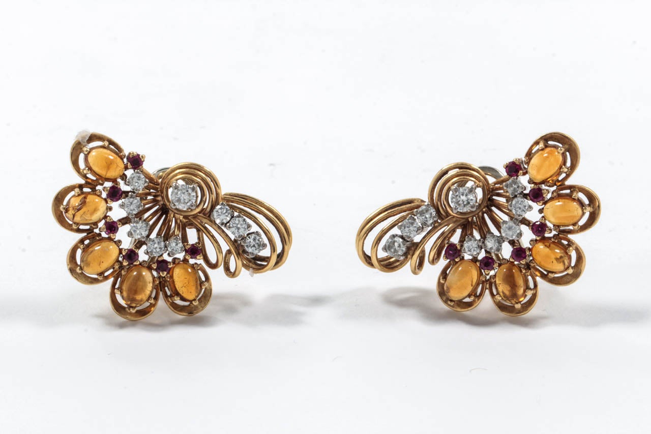 Each set with cabochon citrines, brilliant-cut diamonds and circular rubies.