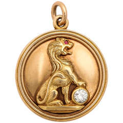 1880s Victorian Gold Lion Resting His Paw on a Diamond Double-Sided Locket