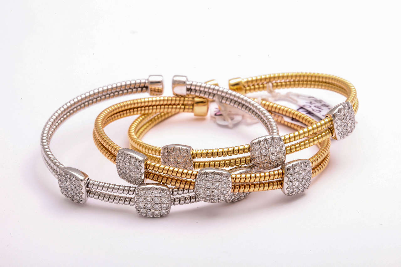 18K Yellow, rose, and white gold bangles featuring 0.85 carats in diamonds.
Great to stack!

Can be sold separately.