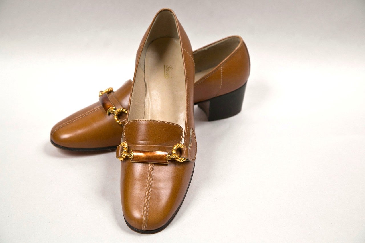 fresh from my personal funkyfinders collection is this pair of  'new old stock' pumps from gucci. the leather palette is complimented with coordinating enamel and brass fittings. size 6.5-7. gorgeous and ready to wear year-round.