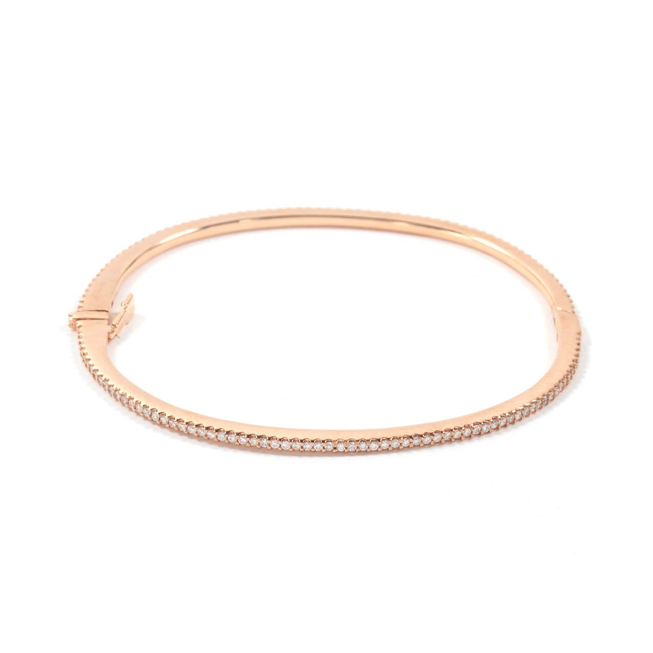 18kt Gold Bangles with Diamonds in rose gold, yellow gold, and white gold options.  Each bangle contains 1.00 carat of diamonds.

Sold individually, $3400 each.