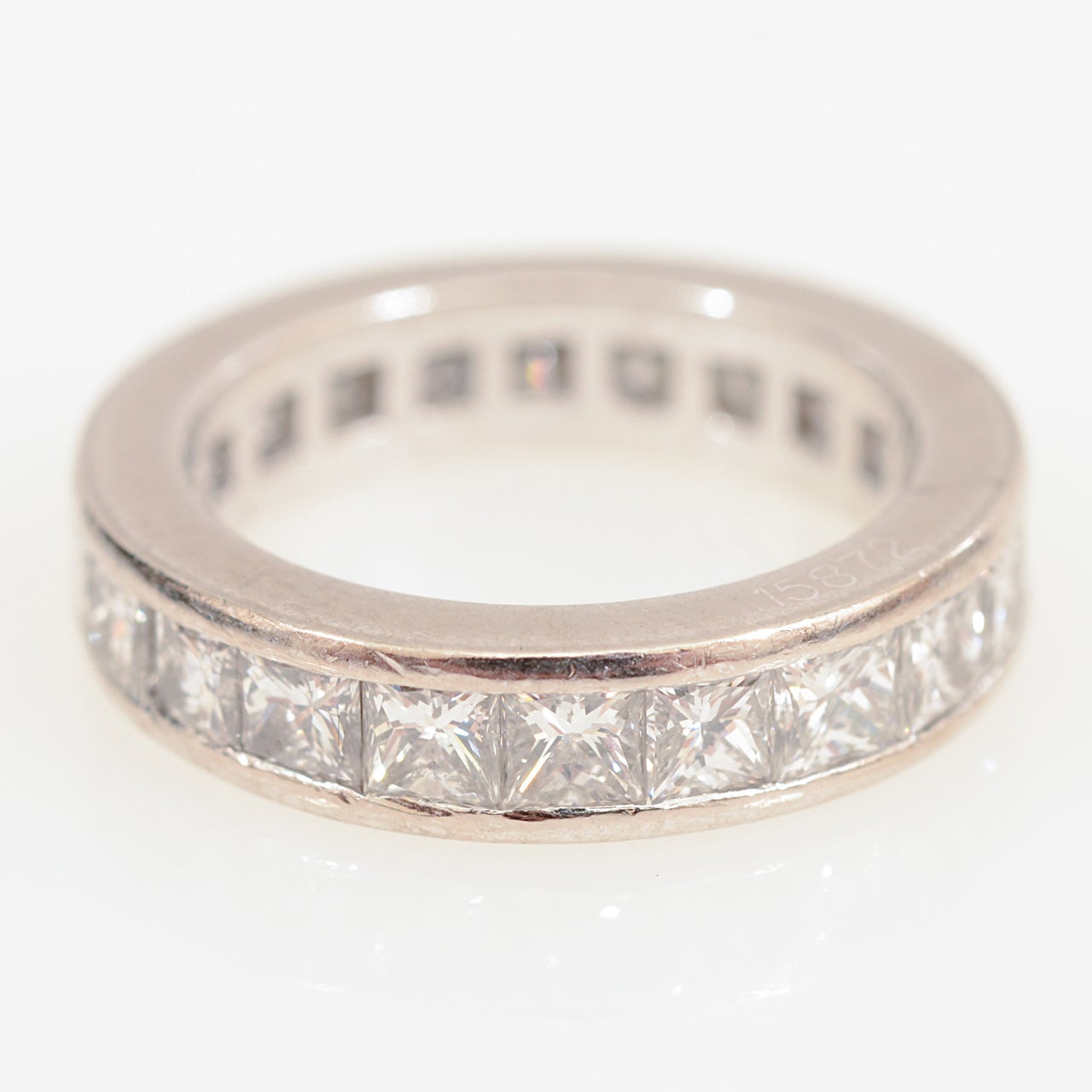 GRAFF Eternity Diamond Ring.

Consist of 22 white princess cut diamonds weighing approximately 3.68 carats,
VS quality.
Size 5 1/2