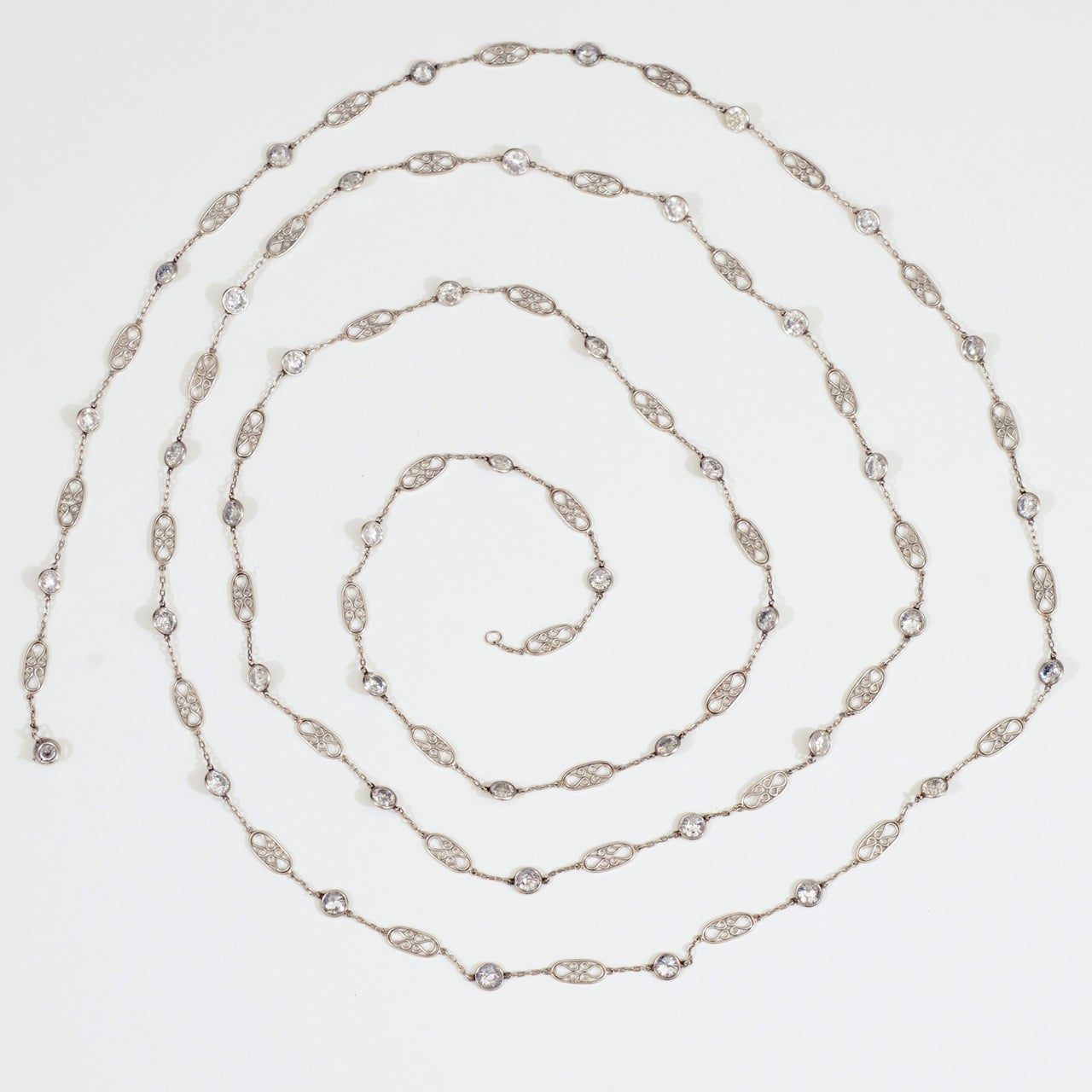 Diamond Platinum Long Chain Necklace. Approximately 27 carats in diamonds,  I-J color V-SSI quality