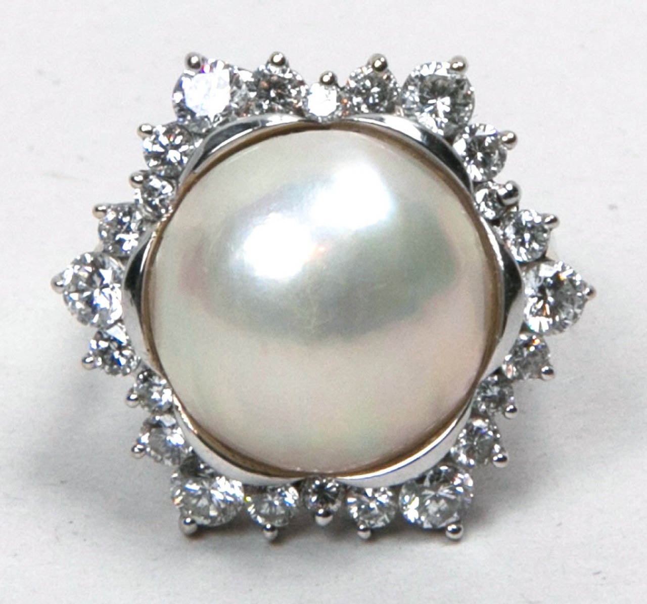 15mm Mobe Pearl Ring with Surrounded Diamonds Set In White Gold Presented by Thought Agency 1