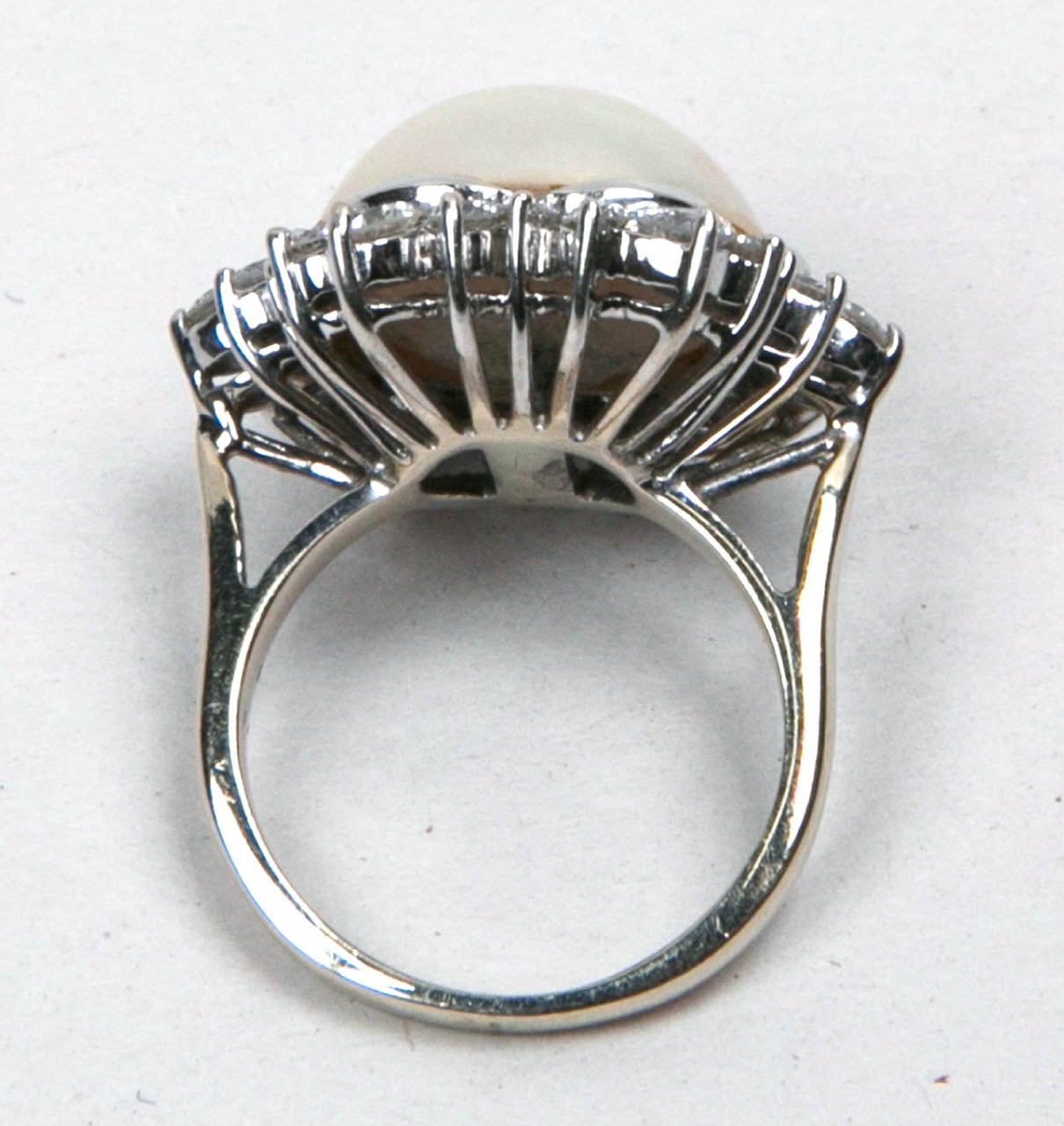 Women's 15mm Mobe Pearl Ring with Surrounded Diamonds Set In White Gold Presented by Thought Agency
