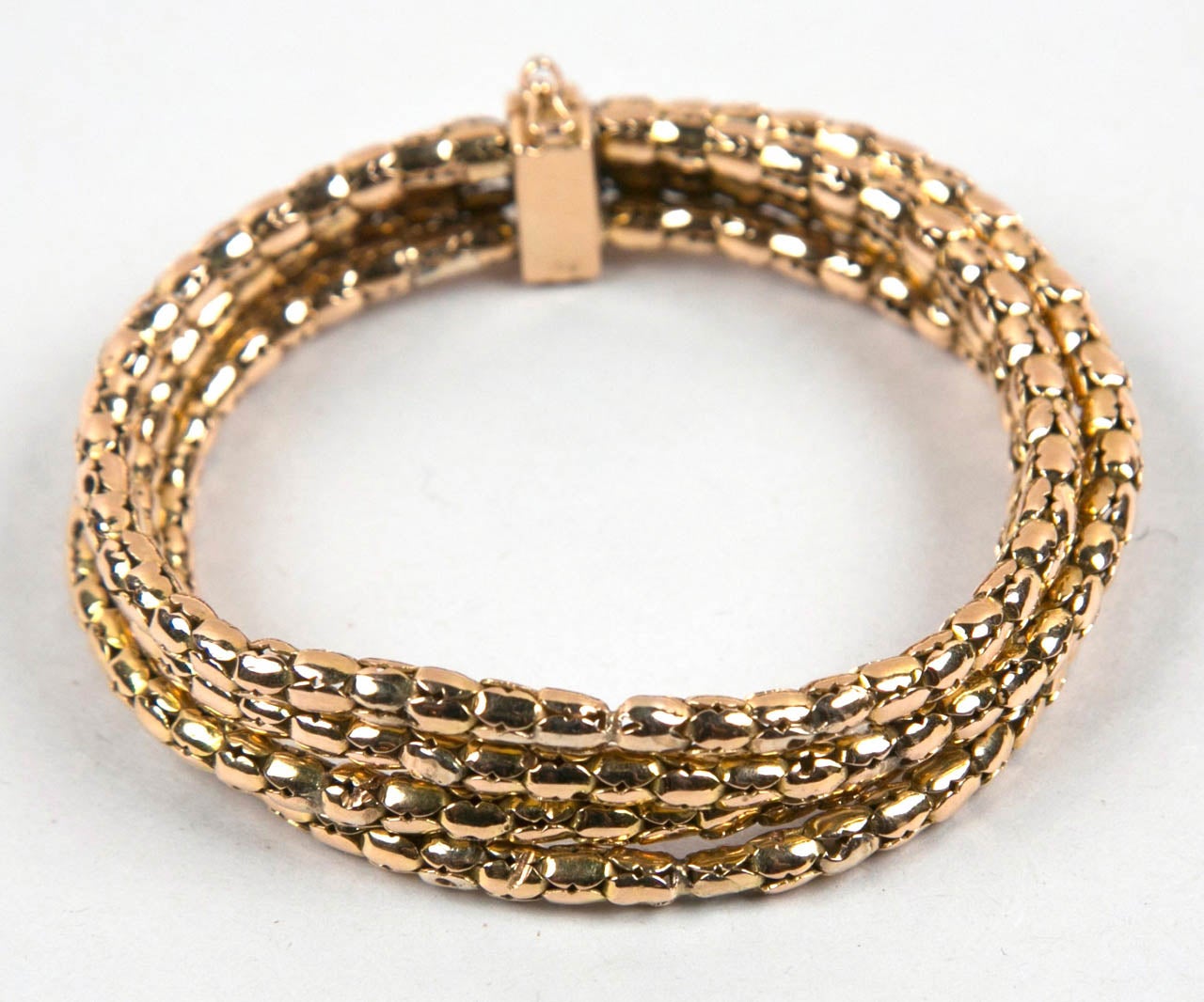 Beautiful and unusual Italian four strand gold bracelet, 18k