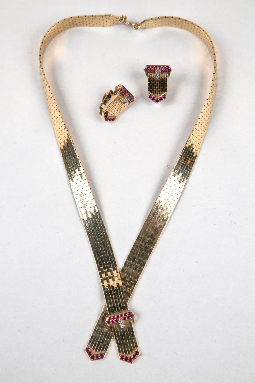 1940's Gold,Ruby and Diamond Necklace and Earring Set.  Rubies and diamonds are all original. Beautifully made piece.
17