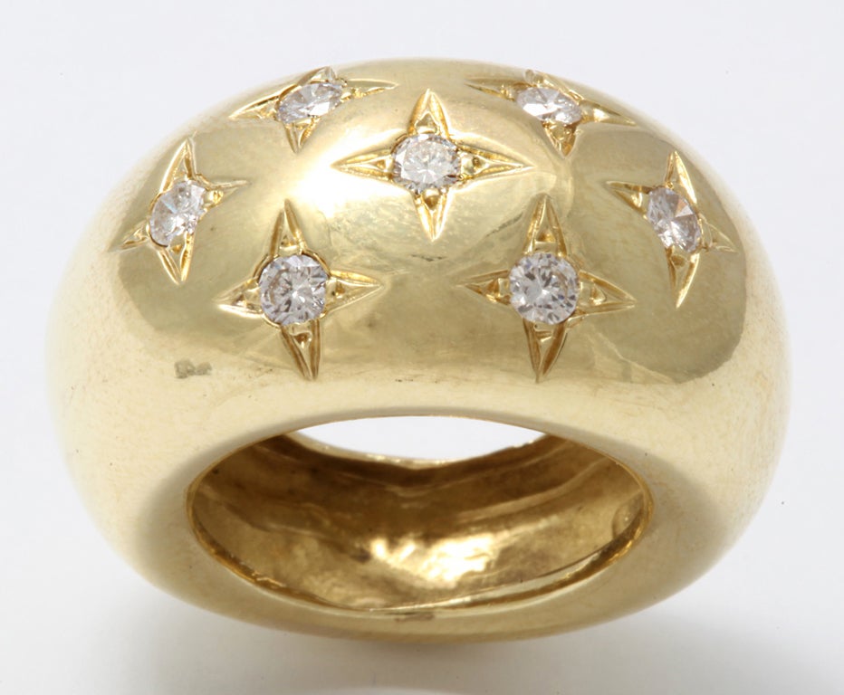 18kt gold bombe style gold ring with 7 diamonds size 6 1/2