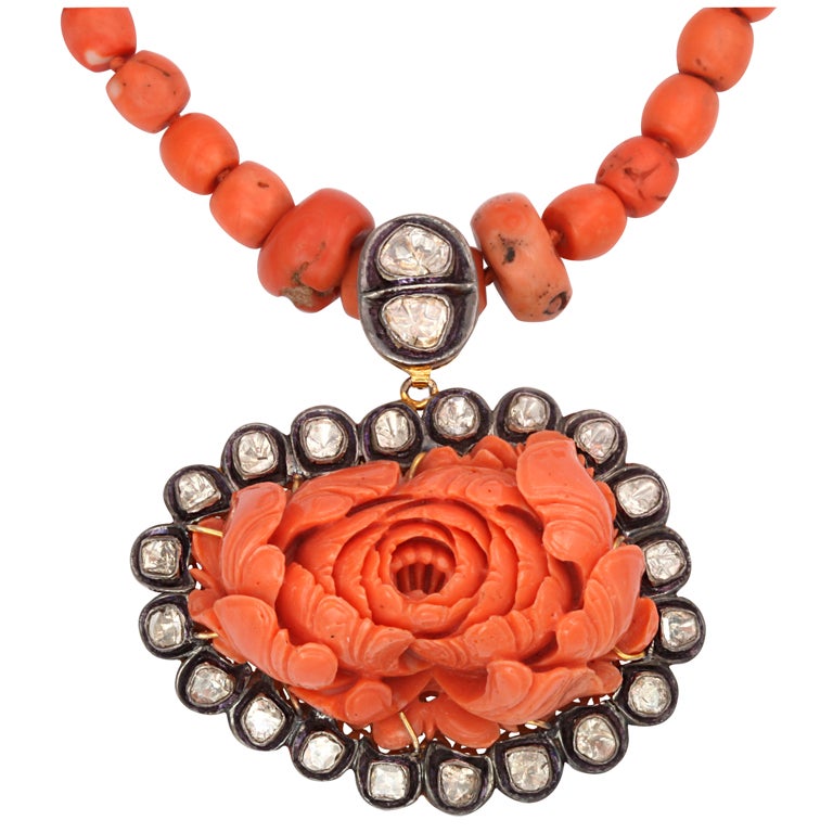 Carved Coral & Diamond Necklace For Sale