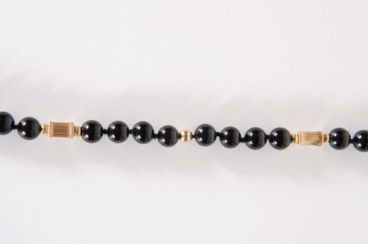 black onyx and gold bead necklace