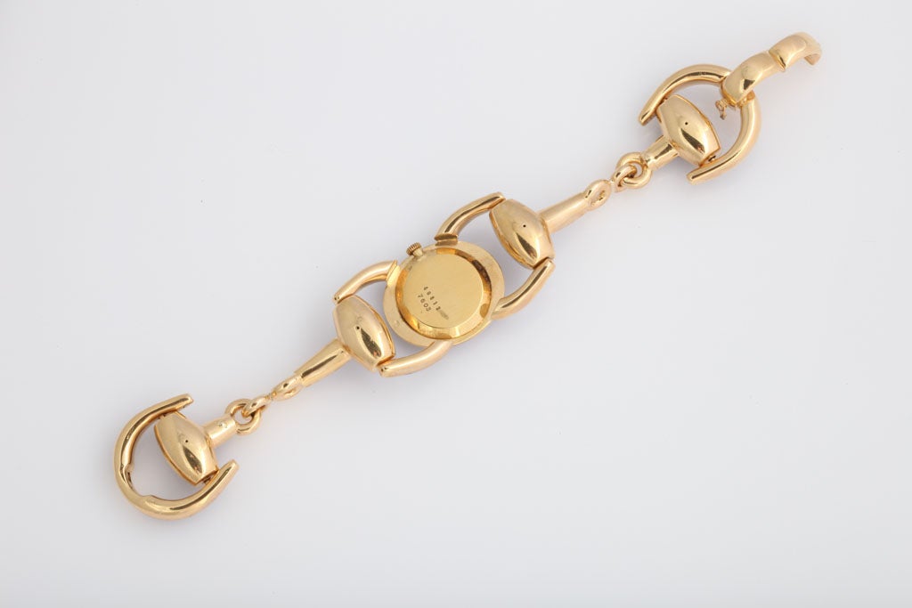 Bueche Girod Ladies Yellow Gold Enamel Stirrup Bracelet Quartz Wristwatch In Excellent Condition In Miami Beach, FL