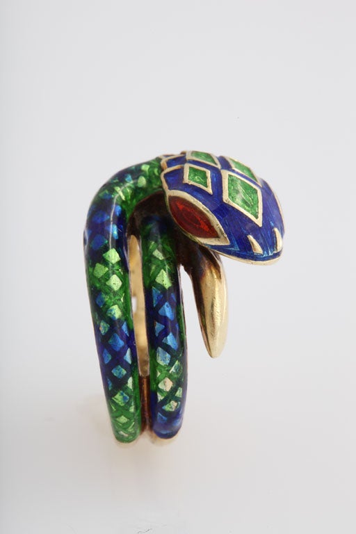 14k Enamel snake ring featuring blue & green enamel body.  The  eyes are red enamel.<br />
<br />
Size 5 3/4 - 6 US